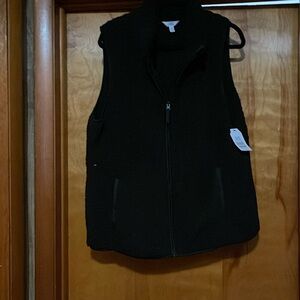 Ladies new with tags black Sherpa vest. Size XL